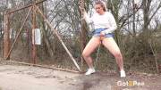 Nikki Dream Holds Onto An Old Gate Before Enjoying A Pee Standing