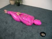 Aimee - Pink Latex Catsuit, Chains And Key Predicament