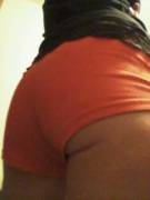 46 Year Old (F)Emale In Tiny, Orange Shorts