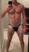 Exposing Strapped Muscle Dad. Black Bike Jockstrap