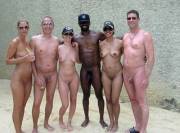 Group Of Nudist Friends Posing For The Photo