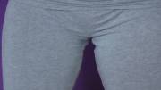 Wetting Her Gray Leggings