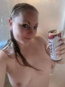 Enjoying A Nice Cold Truly In The Shower