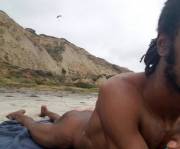 Nice Day At Beach With Hang-Gliders Above