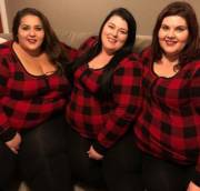 Three Obese And Overweight Sexy Women Smiling Dressed In Red And Black