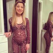 Cutie In A Full Body Leopard Print Catsuit And Ears.