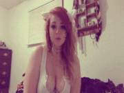 Sitting Up And Stroking Her Face