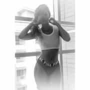 Wearing A See Through Top And Showing Off A Little Bit Of Nips.