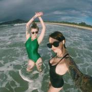 X-Post From /R/Hotchickswithtattoos. Swimmer In The Green Suit Looks Decent For Enhancement.