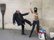 Old Man Has Enough With Femen Protesters.