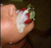 Something Different- A Strawberry Stuck In Her Mouth, Covered With Cum