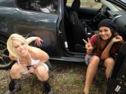 Two Happy Girls Pee Near Car