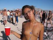 Topless Chick At The Burning Man Gathering In The Black Rock Desert In Nevada