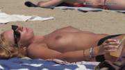 Nice Blonde Topless On The Beach