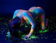 Doggy Position Over Green Glowing Particles