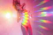 Girl Covered In Rainbow Lens Flare