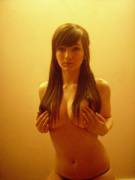 Using Her Hair To Cover Up