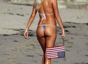 Tiny Bikini Bottoms Are All She Needs To Show Those American Cheeks.