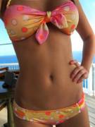 Out On The Deck - What's That Little Machine On The Left Of Her Right Hip?