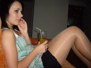 Shiny Tan Pantyhose Legs At A Party