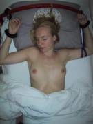 An Incredible Freckled Specimen Cuffed To Her Bed