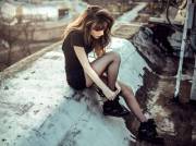 Putting On Her Sneakers