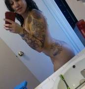 Stripper With A Sleeve Tattoo