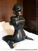 Corset, Posture Collar, Gas Mask And A Lot Of Black Rubber