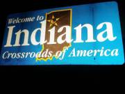 Flashing Under The State Welcome Sign