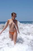 Topless In The Waves (Source Inside)