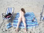 Pale Girl Working On Her Tan