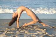 Nude Yoga On The Beach.