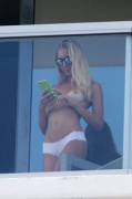 Laura Cremaschi - Topless On Her Hotel Balcony In Miami