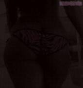 Adjusting Her Bottoms