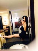 Hitomi Tanaka In A Black Mini Dress.