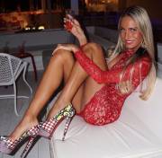 Cute Blonde In A Short Red Dress