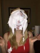 Girl Is Pied And Covered In Chocolate Sauce And Custard.