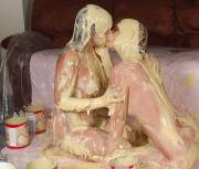Girls Covered In Custard Kissing Each Other 