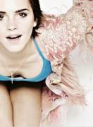Emma Watson Lets Us See Her Cleavage.