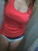 Her Tanktop. She's 43 And Sexy As Hell. Pretty Face Too.