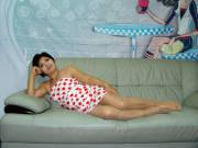 Asian Milf In Polka Dot Dress Looking Sexy.