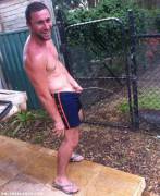 Cute Guy With Dick Out His Swim Trunks, Taking A Leak On The Fence...