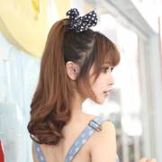 High Curly Ponytail With Ribbon