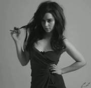 Emilia Clarke Plays With Her Hair And Laughs