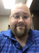 Showing Some Chest Hair During A Meeting