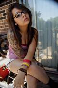 Tattooed Girl With Glasses