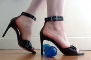 Black Heels And A Toy