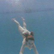 Swimming Redhead Girl