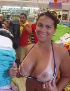 Beauty Flashing Her Big Tits In A Busy Store
