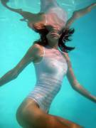 White One Piece Suit.